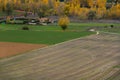 Cultivated Fields with Person and house