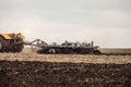 Cultivation of the soil with a disc harrow Royalty Free Stock Photo