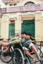 Cultural Continuation:Cyclo drivers in Hanoi, Vietnam, at rest