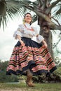 Cultural heritages today. Latin woman with typical Colombian dance costume.