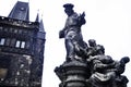 Cultural monument and ancient ruin antique stone statue on Charles Bridge crossing Vltava Moldau river for Czechia people and