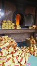 Cultural Traditions: during the festive Lunar New Year, stacks of golden spirit money await ritualistic burning. Royalty Free Stock Photo