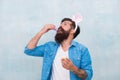 Culture customs and traditions. Easter bunny colored eggs. Celebration of spring holiday. Bearded man bunny ears and