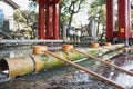 Mineral water was prepared for the villagers to wash their hands and gargle before entering the shrine. Royalty Free Stock Photo