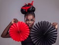 Culture, makeup and creative with portrait of black woman in studio for origami, art and beauty. Traditional, cosmetics