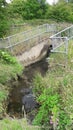 Culvert draining into River Rother Royalty Free Stock Photo
