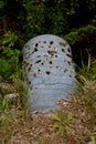 Culvert riddled with bullet holes