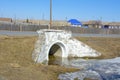 Culvert located under the road. Russia Royalty Free Stock Photo