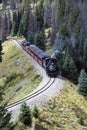 Cumbres and Toltec steam engine historic train chugging slowly up the mountain pass towards Antonito, Colorado Royalty Free Stock Photo