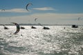 Kite surfers enjoying the sea at the sunset Royalty Free Stock Photo