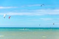 Multiple sports man flying on their kite boarding