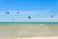 Multiple sports man flying on their kite boarding