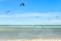 Multiple sports man flying on their kite boarding