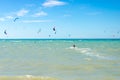 Multiple sports man flying on their kite boarding