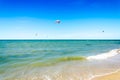 Multiple sports man flying on their kite boarding