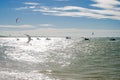 Overexposed effect with Kite surfers enjoying the sea Royalty Free Stock Photo