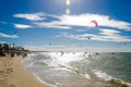 Overexposed effect with Kite surfers enjoying the sea Royalty Free Stock Photo