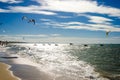 Overexposed effect with Kite surfers enjoying the sea Royalty Free Stock Photo