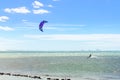 Several kite surfing on the air at the Cumbuco