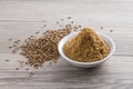 Cumin powder and seeds Royalty Free Stock Photo