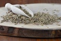 Cumin seed and wooden scoop on board Cuminum cyminum Royalty Free Stock Photo