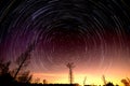 Cumulative time lapse of star trails in night sky Royalty Free Stock Photo