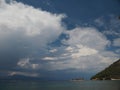 Cumulonimbi storm cloud across island in Saronic Gulf Greece
