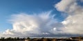 Cumulonimbus Cloud dissipates slowly above the River Great Ouse Royalty Free Stock Photo