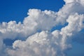 dramatic white clouds in blue sky. cumulonimbus clouds. Royalty Free Stock Photo