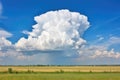 cumulonimbus clouds launching upward in hot weather