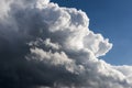 Cumulonimbus clouds from upcoming thunderstorm. Wind piles up the clouds. Heavy rain clouds in sky. Royalty Free Stock Photo