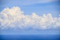 Cumulonimbus , Huge cloud tower, sometimes with anvil. Possible thunderstorm.