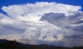 A Cumulonimbus Thundercloud and Five Lightning Strikes