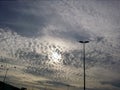 Cumulous clouds and sunset, a view from the road Royalty Free Stock Photo