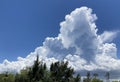 Cumulus Clouds Against Blue Sky