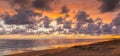 Cumulus clouds beach sunset Royalty Free Stock Photo