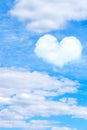 cumulus clouds on blue sky with heart shaped cloud. vertical frame Royalty Free Stock Photo