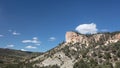 Cumulus clouds over mesa butte in Little Book Cliffs National Monument near Grand Junction Colorado United States Royalty Free Stock Photo