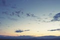 Cumulus clouds of the sunset with the sunset Blue sky blurred background defocusing Royalty Free Stock Photo