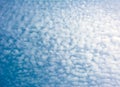 Cumulus clouds against blue sky at clear sunny day