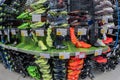 Colorful Football shoes or soccer ball boots displayed in shelves