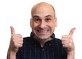 Cunning bald man showing thumbs up