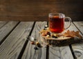 Cuo of tea with nuts and leaves