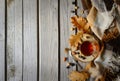 Cuo of tea with plaid and leaves on wood