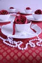 Tea cups with fabric rose stock photo 