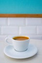 Cup of americano coffee ready to serve on the marble table in the coffee shop in the morning Royalty Free Stock Photo