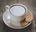 Cup of aroma coffee with cookies on a wooden table. Royalty Free Stock Photo