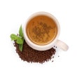 Cup of aromatic buckwheat tea, granules and mint on white background, top view Royalty Free Stock Photo