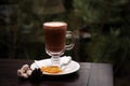 Cup of aromatic cacao on table