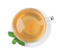 Cup of aromatic green tea with fresh mint on white background, top view Royalty Free Stock Photo